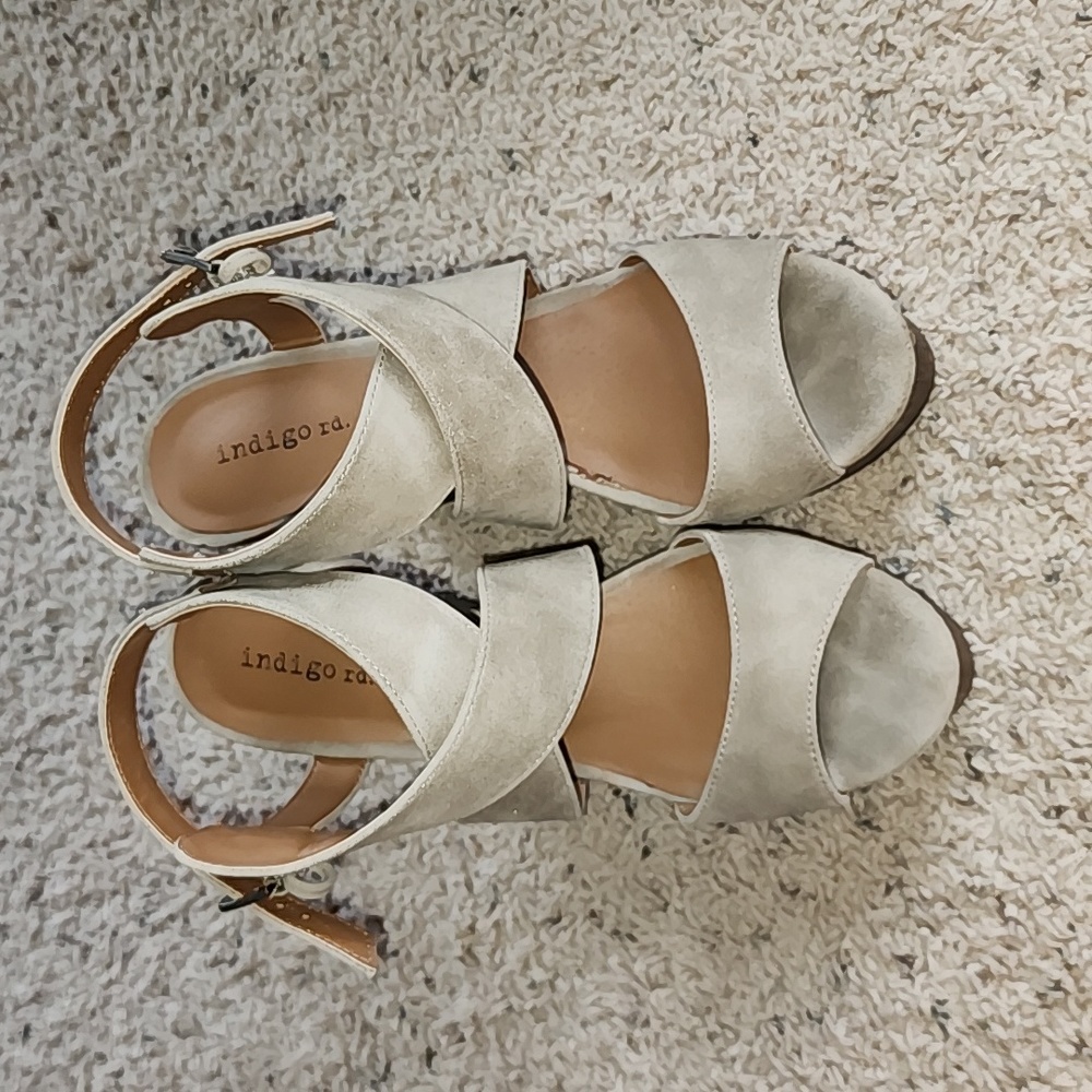 Indigo wedges. Size 8.5 suade material. Light tan color
